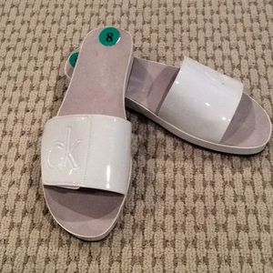 Brand new Calvin Klein flip flops